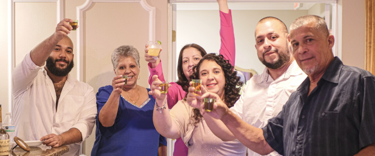 partygoers toasting in the Leesburg venue bar