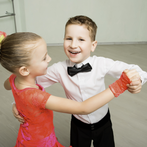children ballroom dancing together