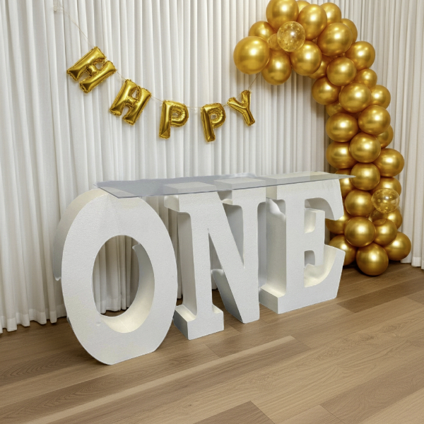 white number one first anniversary letter table